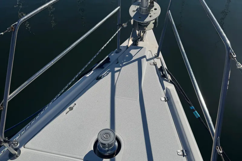 Slide: The Image of Bow of 2001 Catalina 42 MK II sailboat with stainless steel railings. - 6