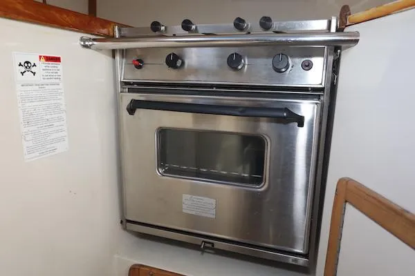 Slide: The Image of Stainless steel oven in a 2000 Catalina 320 yacht kitchen. - 7