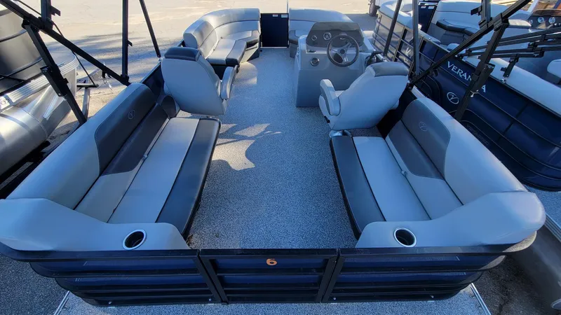 Slide: The Image of 2023 Veranda Vista 20 RC pontoon boat with spacious seating and modern helm. - 10