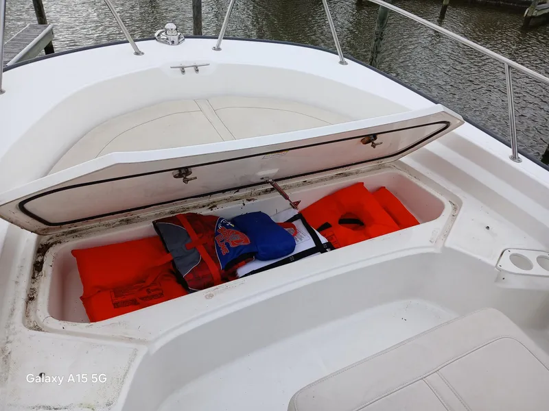 Slide: The Image of 2018 Boston Whaler 190 Montauk boat storage with life jackets and safety gear. - 20