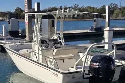 The Image of 2018 Boston Whaler 190 Montauk boat docked at marina with Mercury engine. - 0