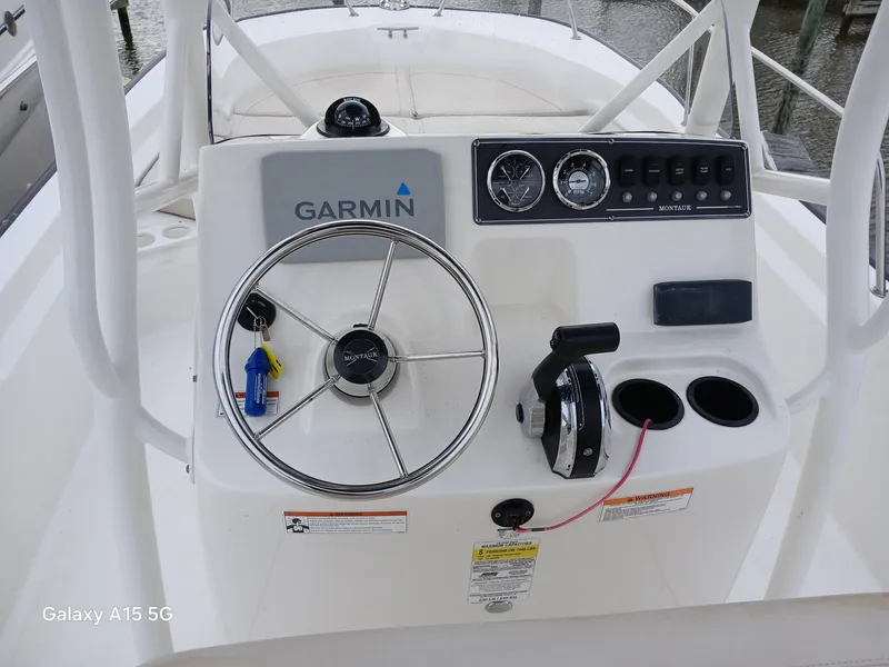 Slide: The Image of 2018 Boston Whaler 190 Montauk boat console with Garmin navigation system. - 13