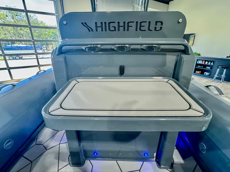 Slide: The Image of 2025 Highfield Sport 560 boat interior with sleek design and modern features. - 16