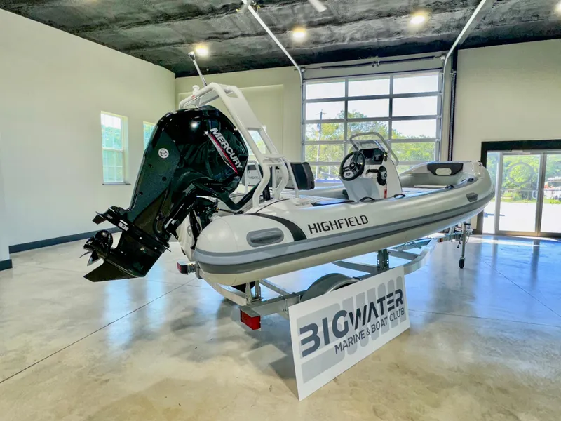Slide: The Image of 2025 Highfield Sport 460 boat displayed indoors at Bigwater Marine & Boat Club. - 1