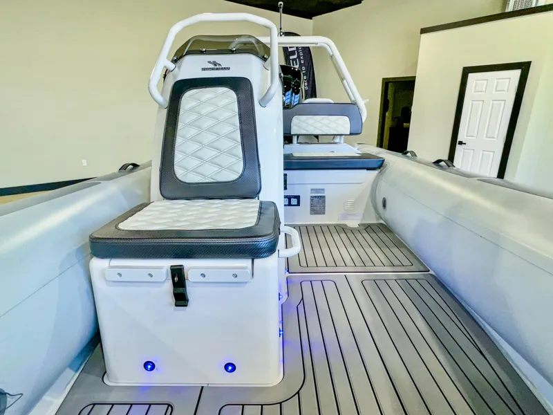 Slide: The Image of 2025 Highfield Sport 460 boat interior with modern seating and sleek design. - 10