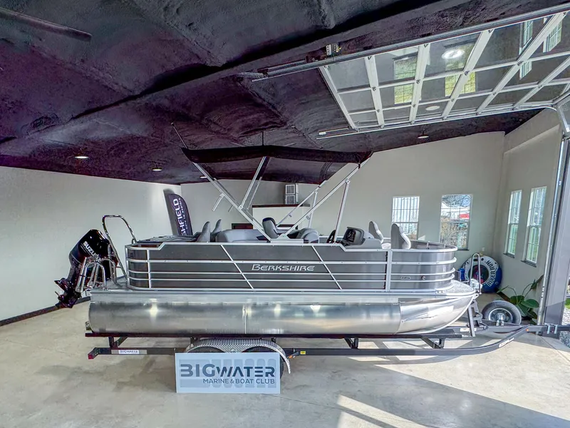 The Image of 2025 Berkshire 20′ LE pontoon boat displayed indoors at Big Water Marine Boat Club. - 1