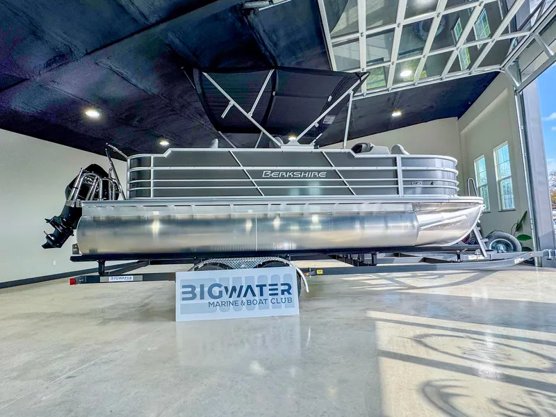 Slide: The Image of 2025 Berkshire 20′ LE pontoon boat displayed at Big Water Marine showroom. - 2
