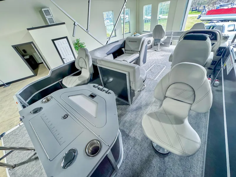 Slide: The Image of Interior of 2025 Berkshire 20′ LE pontoon boat with modern seating and helm station. - 8