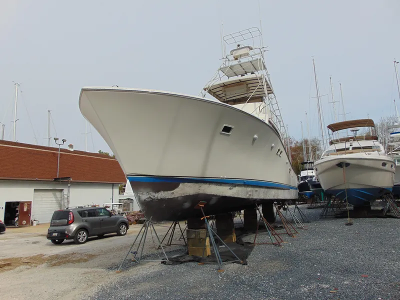 Slide: The Image of 1981 Post 46 Sportfish boat on dry dock, ready for maintenance. - 29