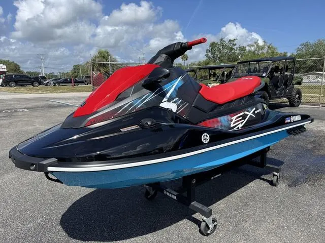 Slide: The Image of 2024 Yamaha WaveRunner EX in red and yellow, displayed outdoors on a sunny day. - 4