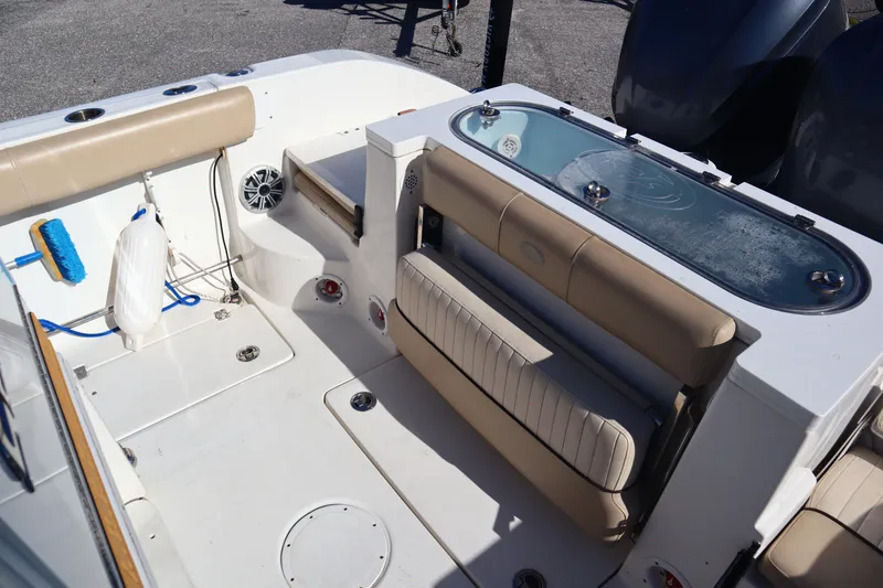 Slide: The Image of 2017 Sea Fox 288 Commander boat interior with seating and storage features. - 12
