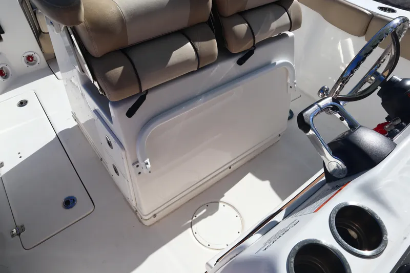 Slide: The Image of 2017 Sea Fox 288 Commander boat interior with seating and steering wheel. - 16