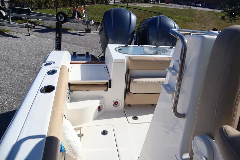Slide: The Image of 2017 Sea Fox 288 Commander boat interior with dual engines and seating area. - 19