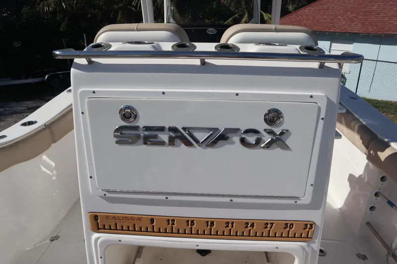 Slide: The Image of 2017 Sea Fox 288 Commander boat interior with logo and measuring board. - 25