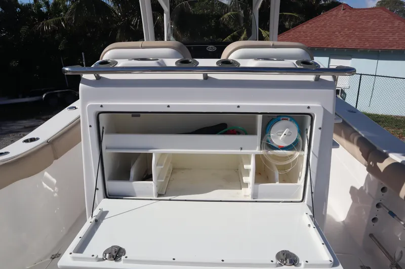 Slide: The Image of 2017 Sea Fox 288 Commander boat storage compartment with open hatch, showcasing organized interior. - 26