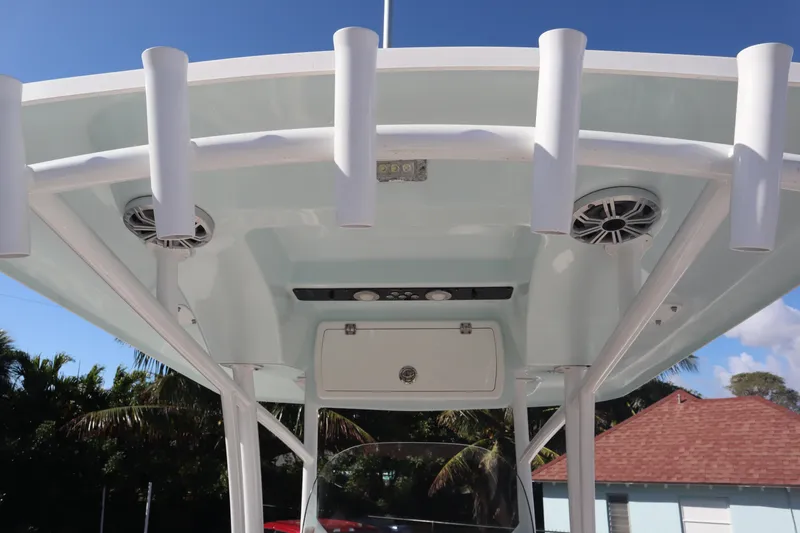 Slide: The Image of 2017 Sea Fox 288 Commander boat roof with rod holders and speakers. - 28