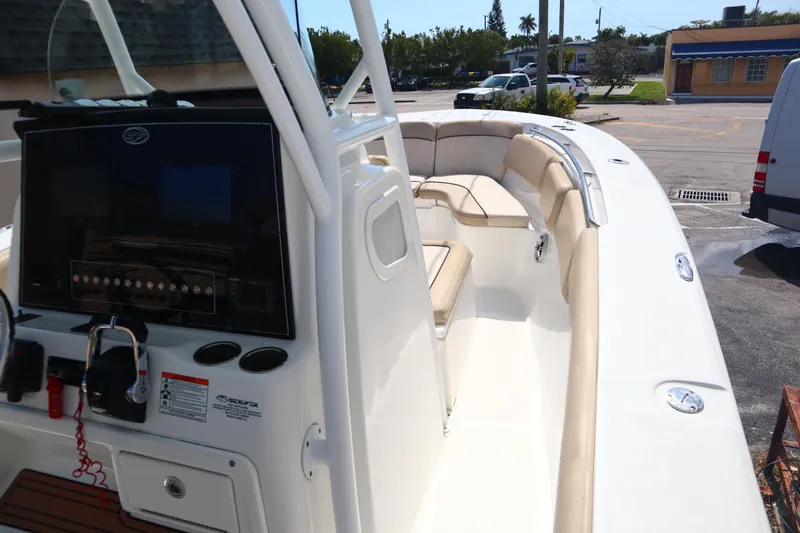 Slide: The Image of 2017 Sea Fox 288 Commander boat interior with seating and control panel. - 32