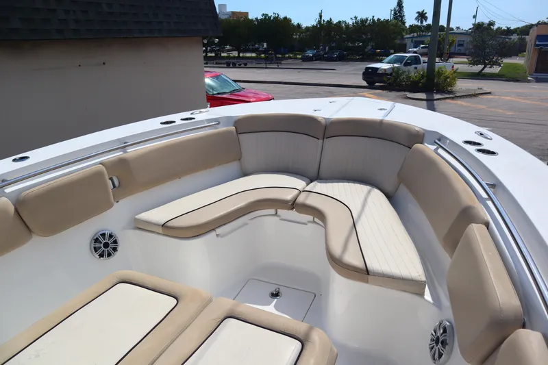 Slide: The Image of 2017 Sea Fox 288 Commander boat with beige cushioned seating in the bow area. - 33
