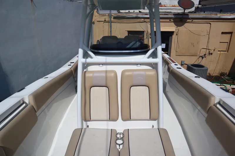 Slide: The Image of 2017 Sea Fox 288 Commander boat interior with beige seating and white trim. - 40