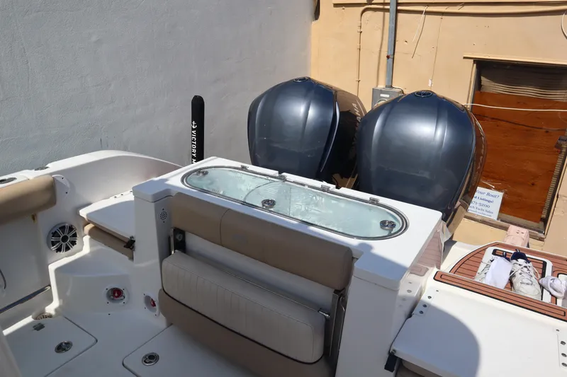 Slide: The Image of 2017 Sea Fox 288 Commander boat with dual outboard engines and seating area. - 44