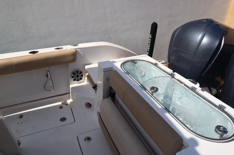 Slide: The Image of 2017 Sea Fox 288 Commander boat interior with seating and storage compartments. - 45