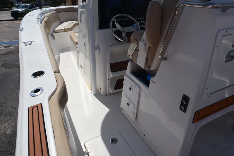 Slide: The Image of 2017 Sea Fox 288 Commander boat interior with seating and console. - 46