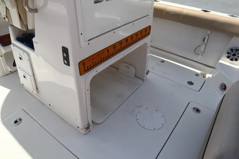 Slide: The Image of 2017 Sea Fox 288 Commander boat deck with storage and measuring ruler. - 47