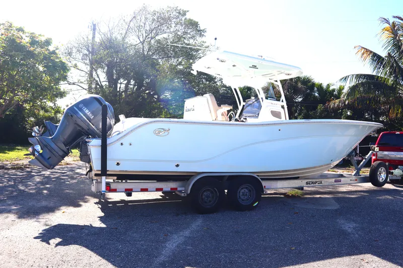 Slide: The Image of 2017 Sea Fox 288 Commander boat on trailer, parked outdoors. - 72