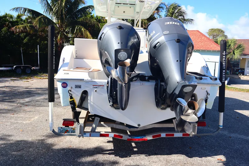 Slide: The Image of 2017 Sea Fox 288 Commander boat with dual outboard engines on a trailer. - 8