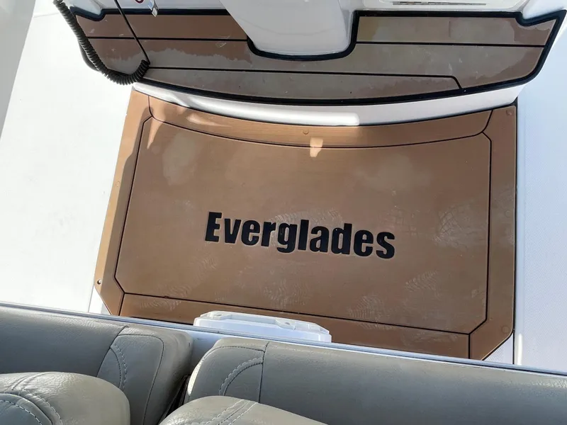 Slide: The Image of 2020 Everglades 273 Center Console boat deck with branded mat. - 22