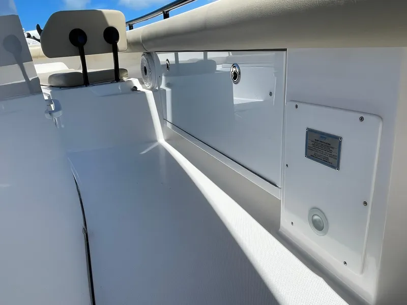 Slide: The Image of 2020 Everglades 273 Center Console interior, featuring sleek white design and modern fittings. - 30