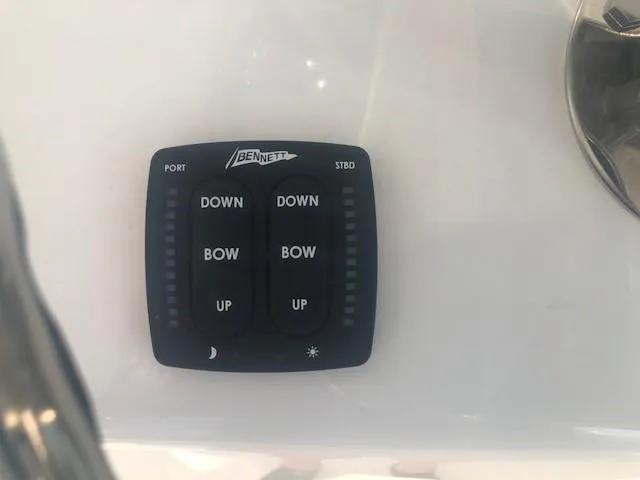 Slide: The Image of Bennett trim tab control panel on 2017 Albemarle 27 Express boat. - 18