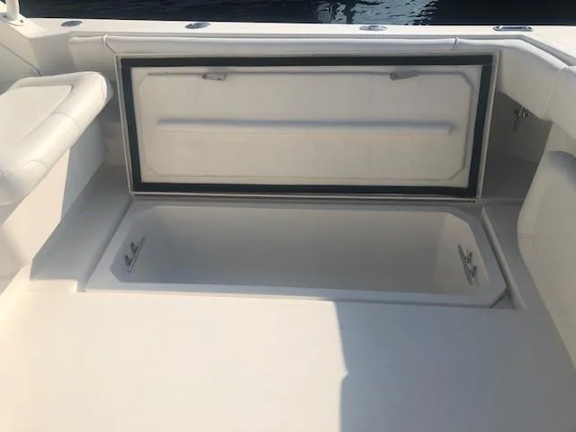 Slide: The Image of 2017 Albemarle 27 Express boat storage compartment, open and spacious. - 30