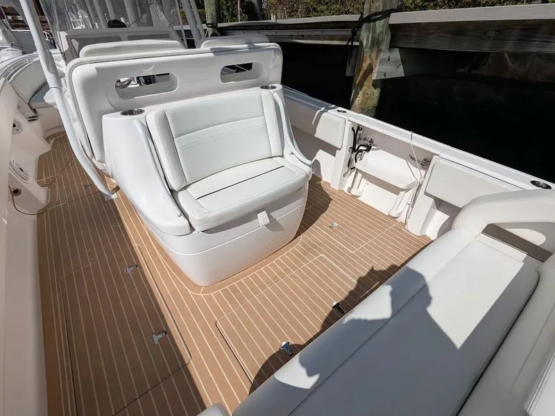Slide: The Image of Intrepid 327 Center Console 2017 boat interior with upgraded seating and modern design. - 10