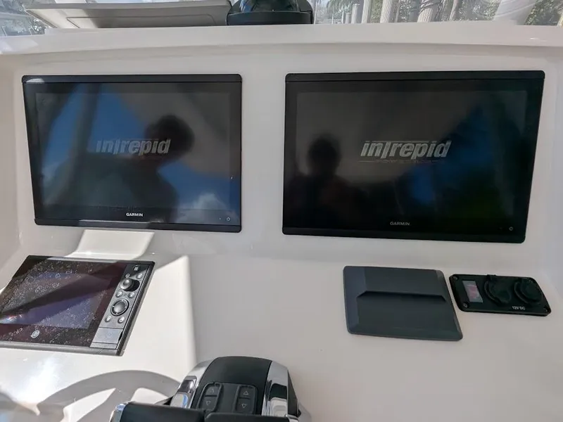 Slide: The Image of Control panel of 2017 Intrepid 327 Center Console with upgraded motors. - 24