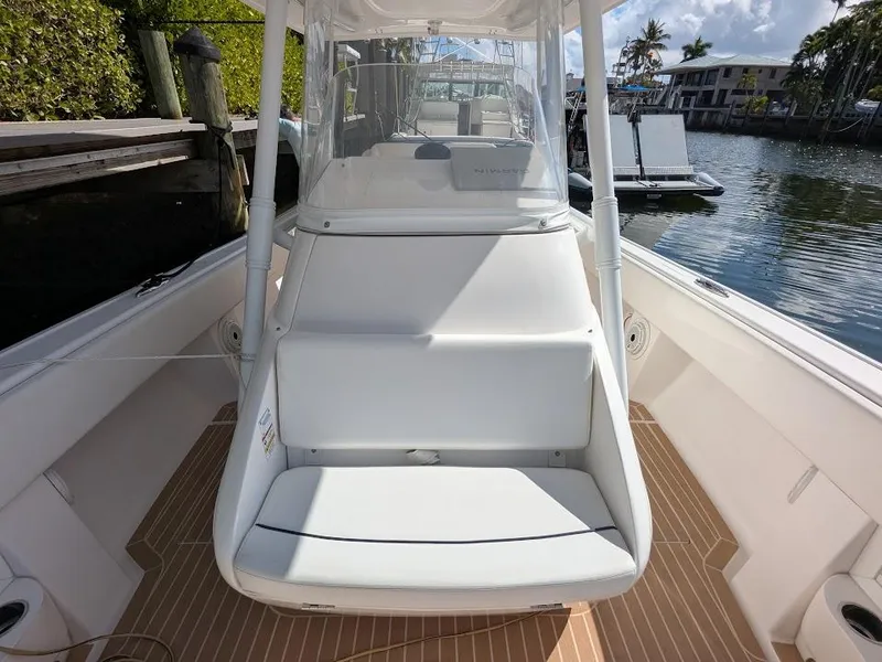 Slide: The Image of Intrepid 327 Center Console 2019, upgraded motors, docked by waterfront, 2017 model. - 32