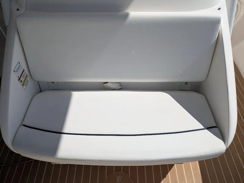 Slide: The Image of White cushioned seat on 2017 Intrepid 327 Center Console boat with upgraded motors. - 47
