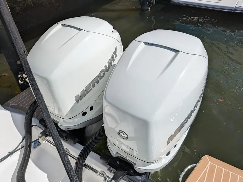 Slide: The Image of Twin Mercury outboard motors on Intrepid 327 Center Console boat, 2019 upgraded model. - 48