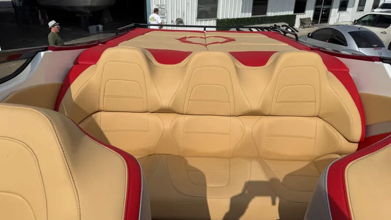 Slide: The Image of 2007 Fountain 42 Lightning boat interior with beige and red seating. - 21
