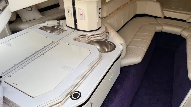 Slide: The Image of Interior of 2007 Fountain 42 Lightning boat with white seating and dual sinks. - 29
