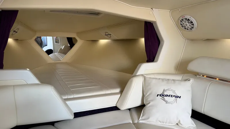 Slide: The Image of Interior of 2007 Fountain 42 Lightning boat with luxurious seating and branded pillow. - 31