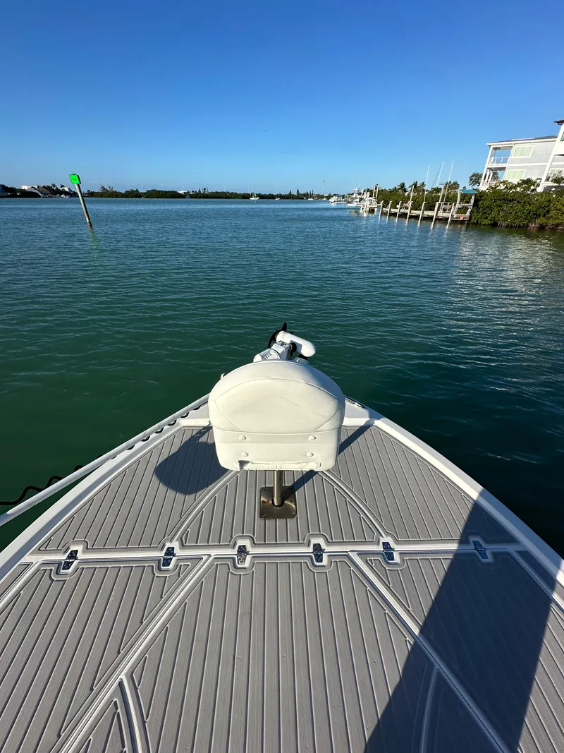Slide: The Image of Bow view of 2021 Parker 2600 SH boat on calm water. - 31