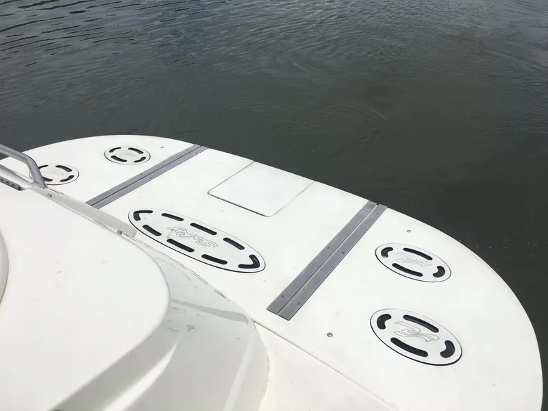 Slide: The Image of Rear deck of 2000 Sea Ray 410 Sundancer boat on water. - 28