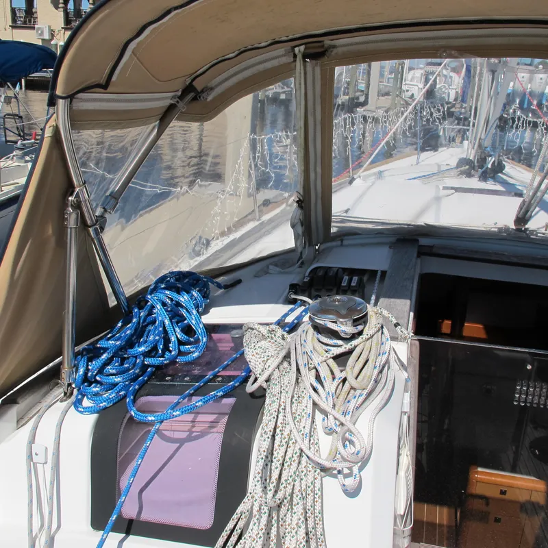 Slide: The Image of Jeanneau Sun Odyssey 379 sailboat cockpit with ropes, 2013 model. - 13