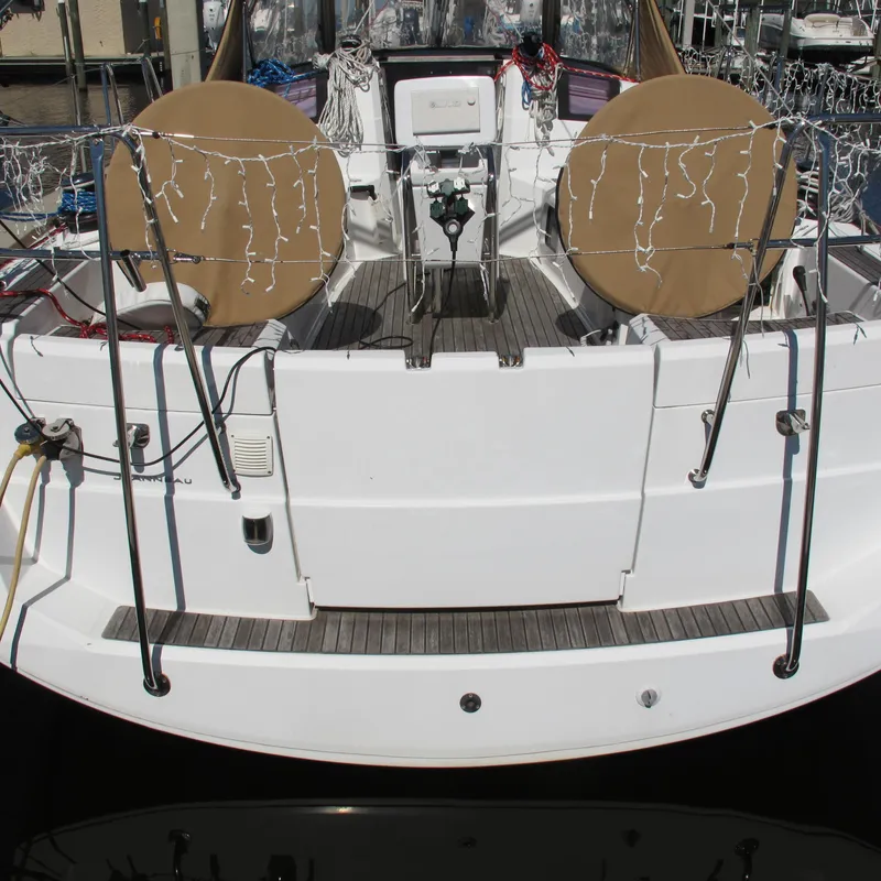 Slide: The Image of 2013 Jeanneau Sun Odyssey 379 yacht stern with deck and railings. - 21