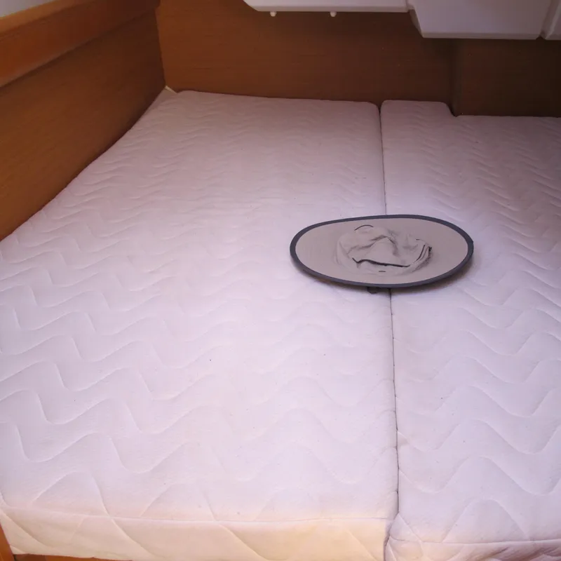 Slide: The Image of Cabin bed in 2013 Jeanneau Sun Odyssey 379 sailboat interior. - 34