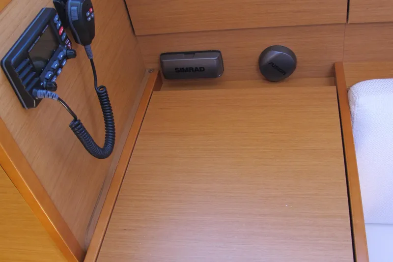 Slide: The Image of Interior view of 2013 Jeanneau Sun Odyssey 379 yacht with communication equipment. - 42