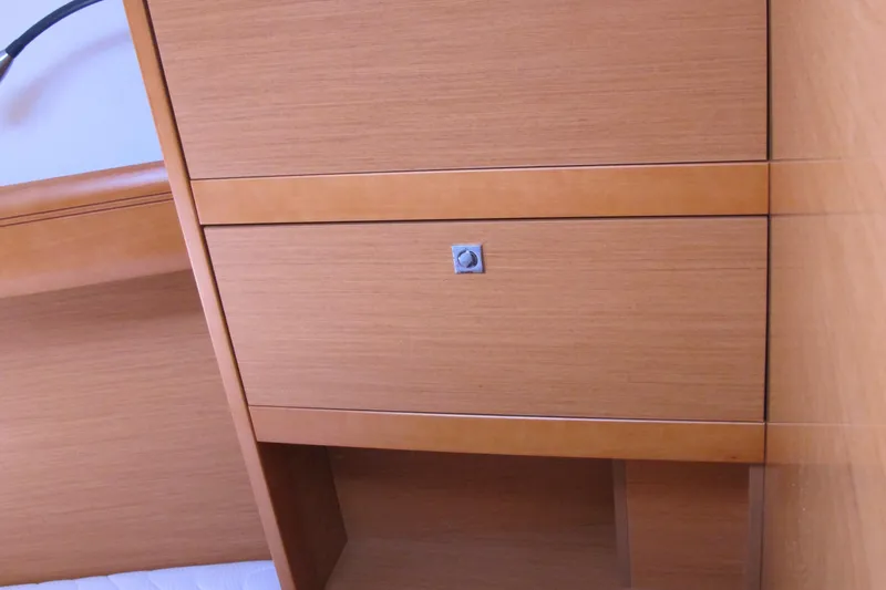 Slide: The Image of Wooden cabinet detail on 2013 Jeanneau Sun Odyssey 379 yacht interior. - 43