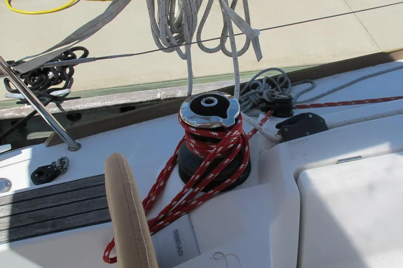 Slide: The Image of Winch and ropes on 2013 Jeanneau Sun Odyssey 379 sailboat deck. - 66
