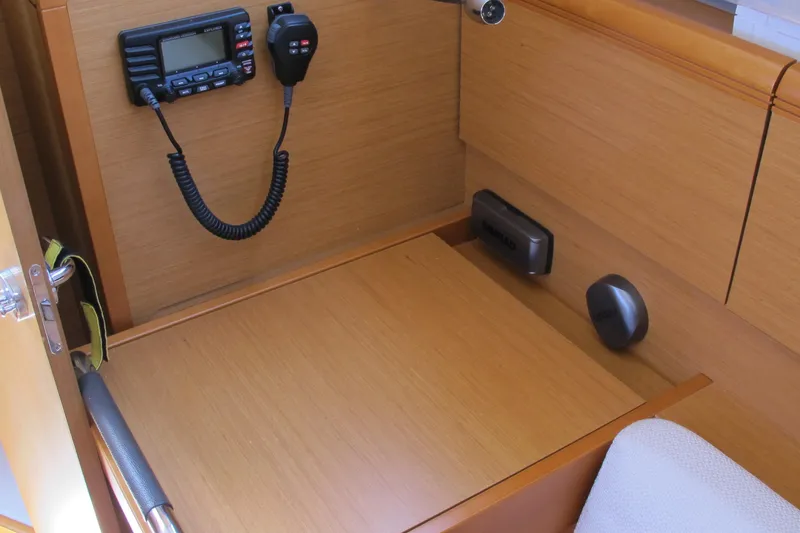 Slide: The Image of Interior of 2013 Jeanneau Sun Odyssey 379 yacht with communication equipment. - 68